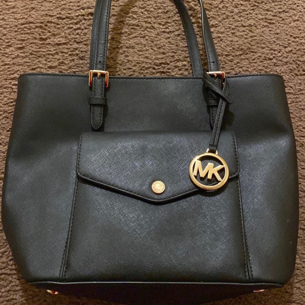 Michael kors used twice